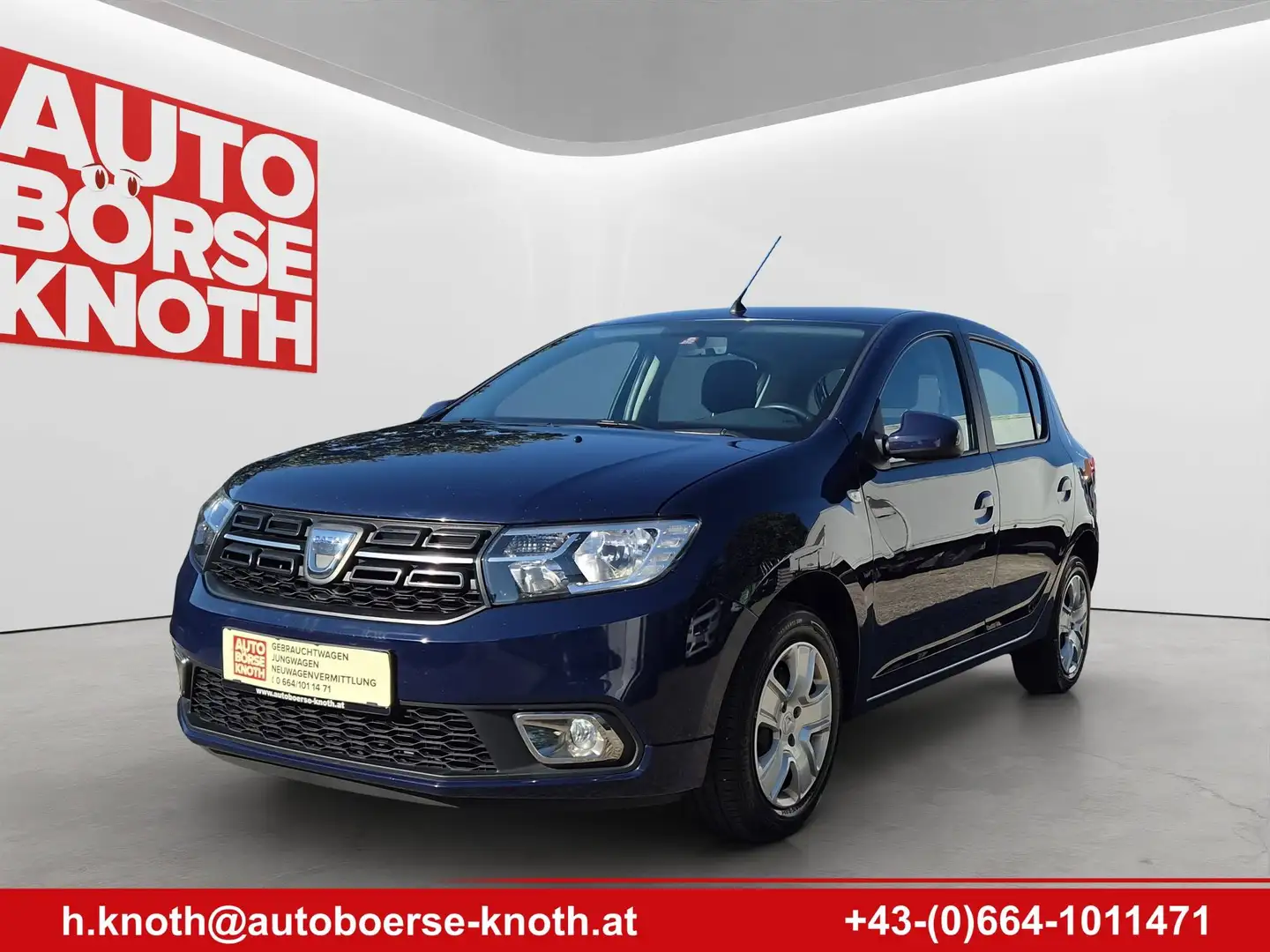 Dacia Sandero Comfort, Winterreifen, Navi Blau - 1