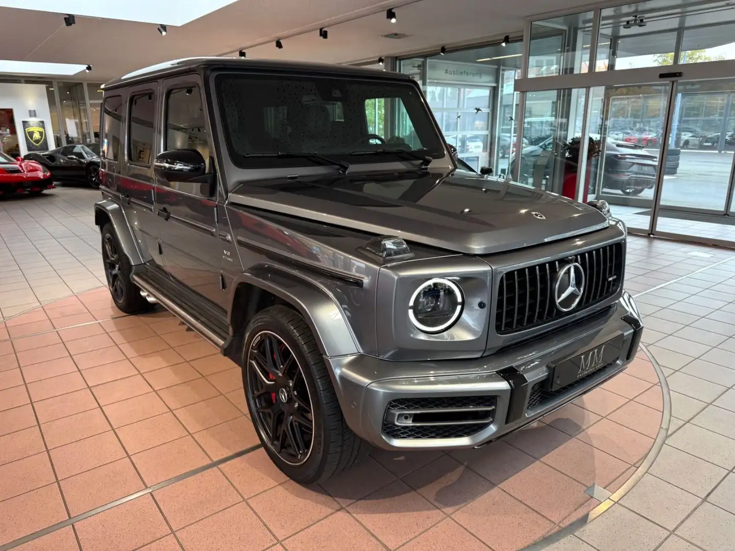 Mercedes-Benz G 63 AMG Entertain/DriversP/Exclusiv/Performance Grijs - 1