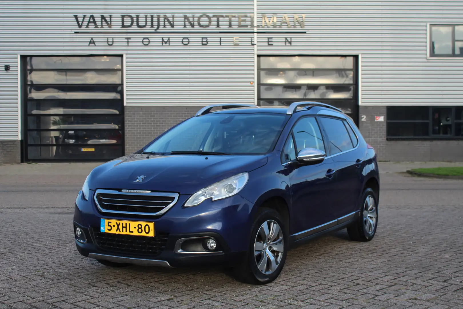 Peugeot 2008 1.2 VTi Allure / Automaat / Panoramadak / Navigati Blauw - 1