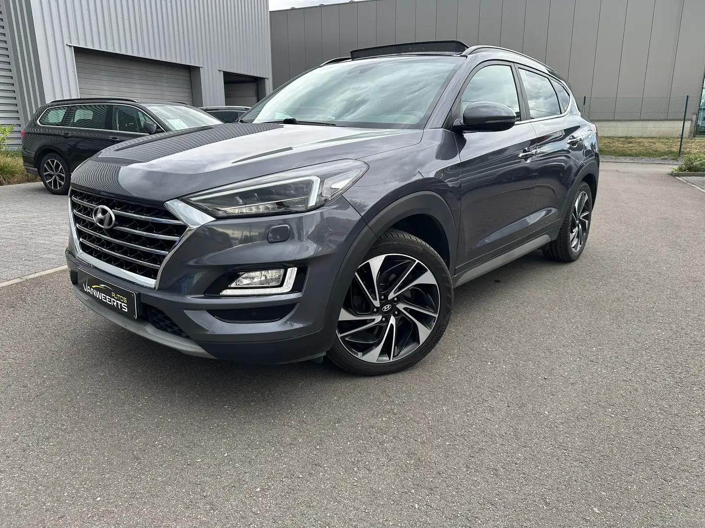 Hyundai TUCSON 1.6 GDi AUTOMAAT Premium 177 PK, FULL OPTION Grey - 1