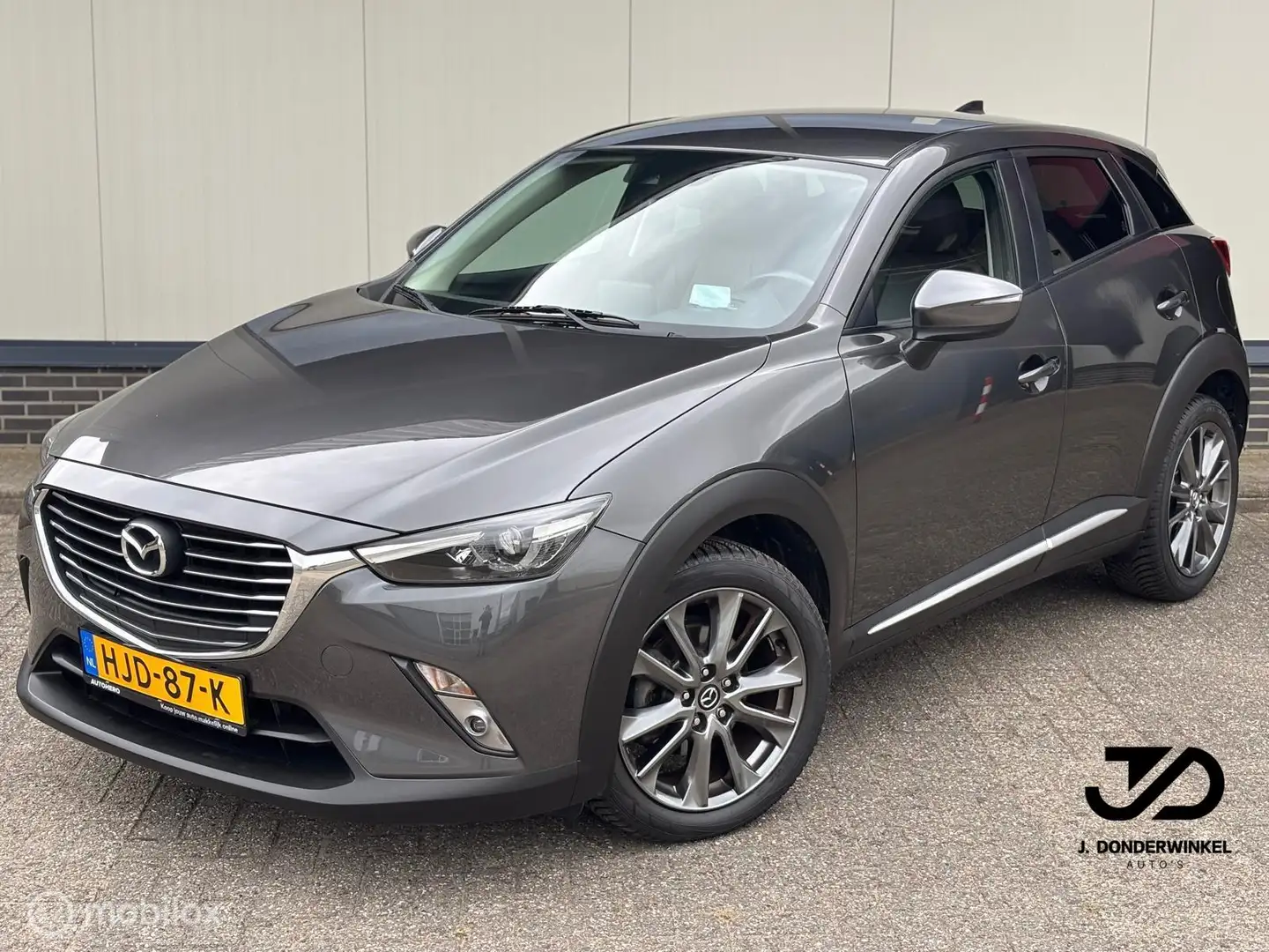 Mazda CX-3 2.0 SkyActiv-G 120 Leder Navi Camera HUD Rijklaar Grijs - 1