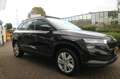 Skoda Karoq 1.5 TSI ACT Sportline Business / panoramadak / car Zwart - thumbnail 4
