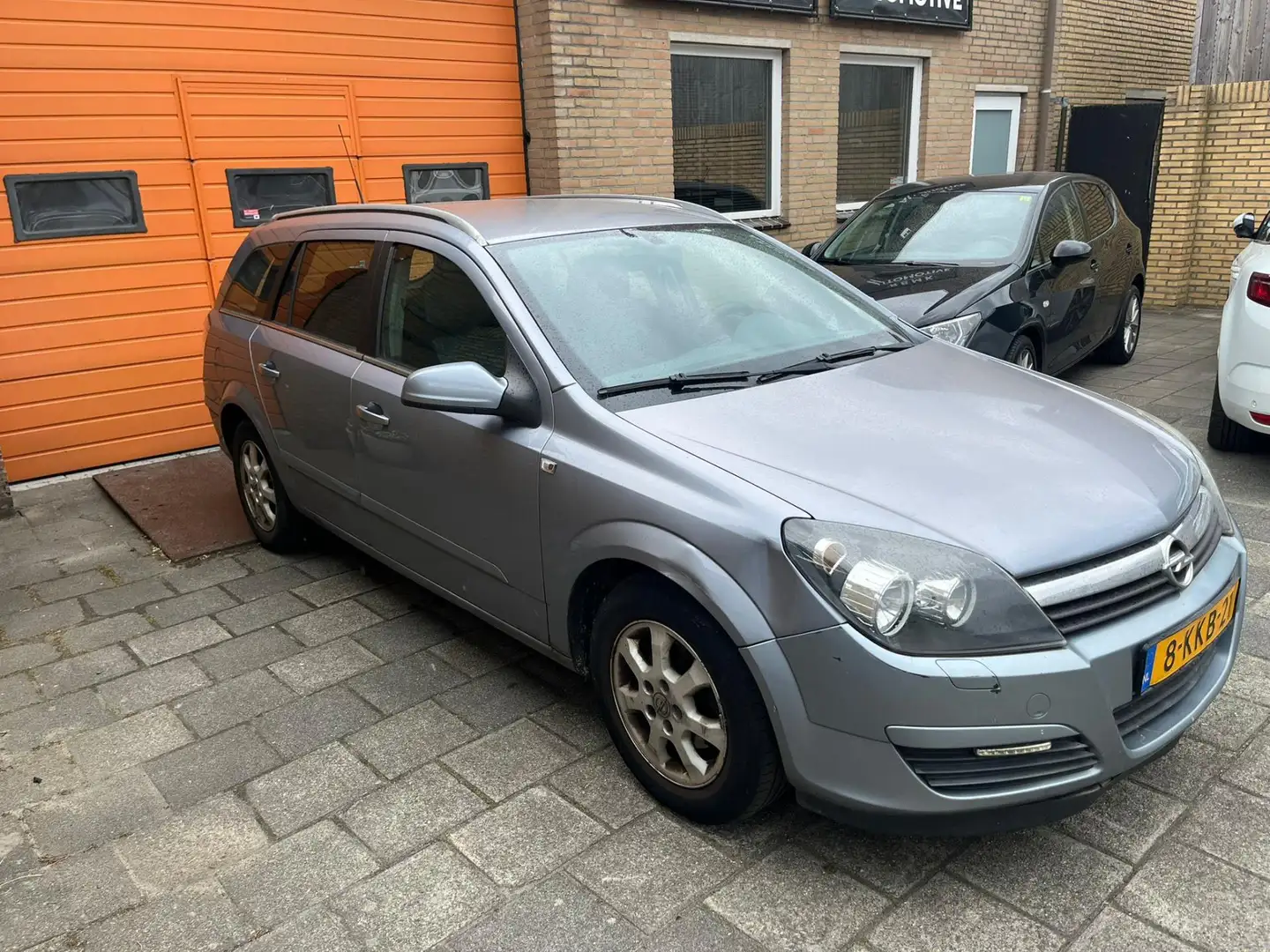 Opel Astra Wagon 1.6 Cosmo Grijs - 2