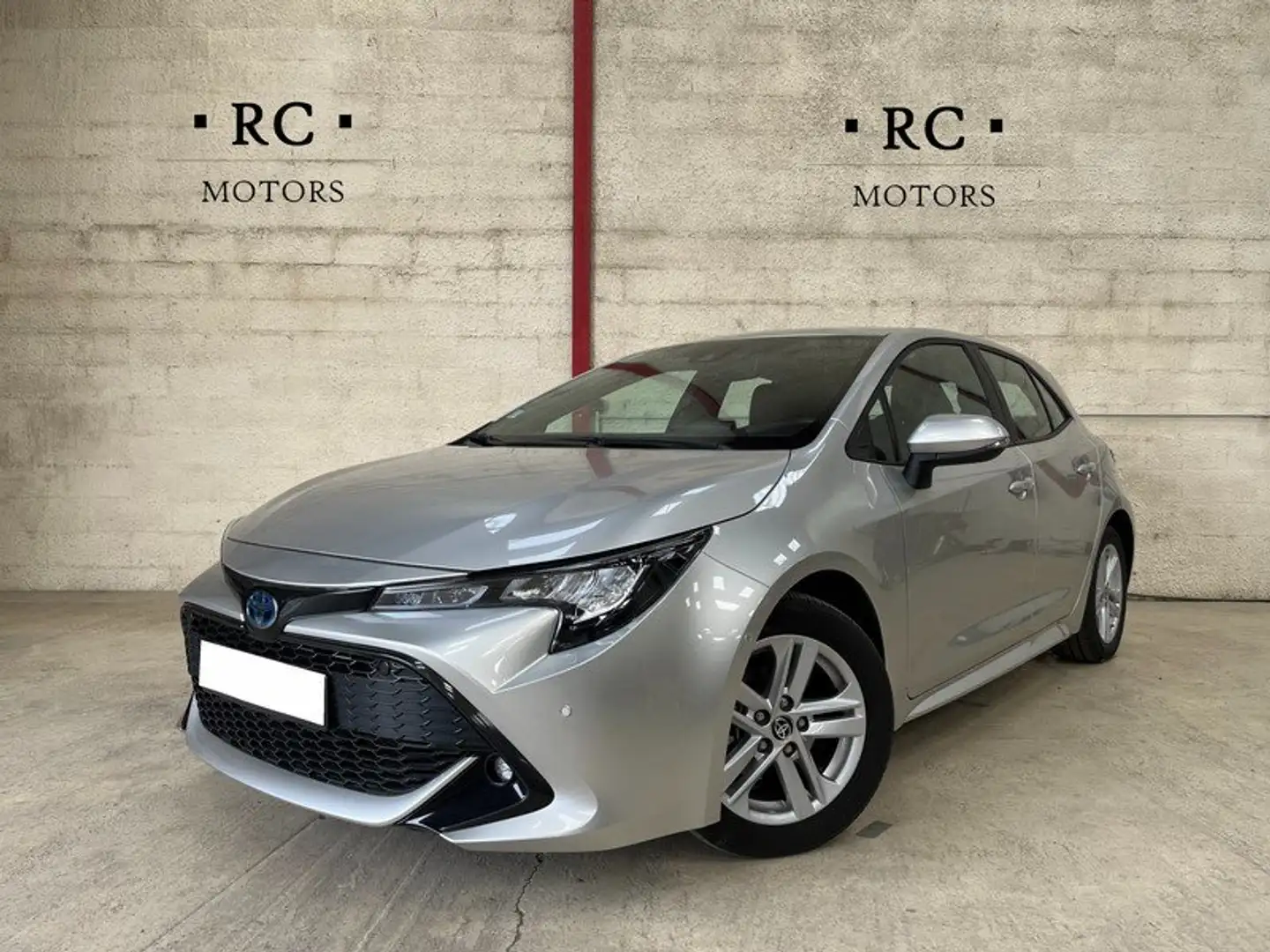 Toyota Corolla Hybrid 122h Dynamic Bus *PkAssist *Cam *Carplay Argent - 1