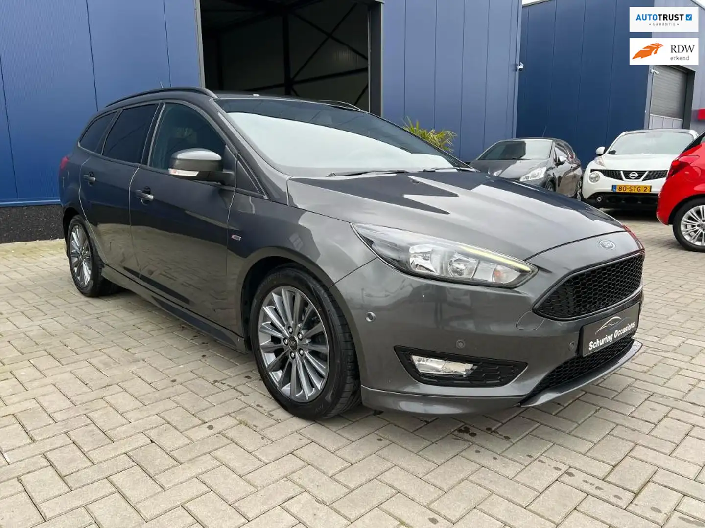 Ford Focus 1.0 EcoBoost ST Line Business 140PK / CARPLAY / PD Grijs - 1