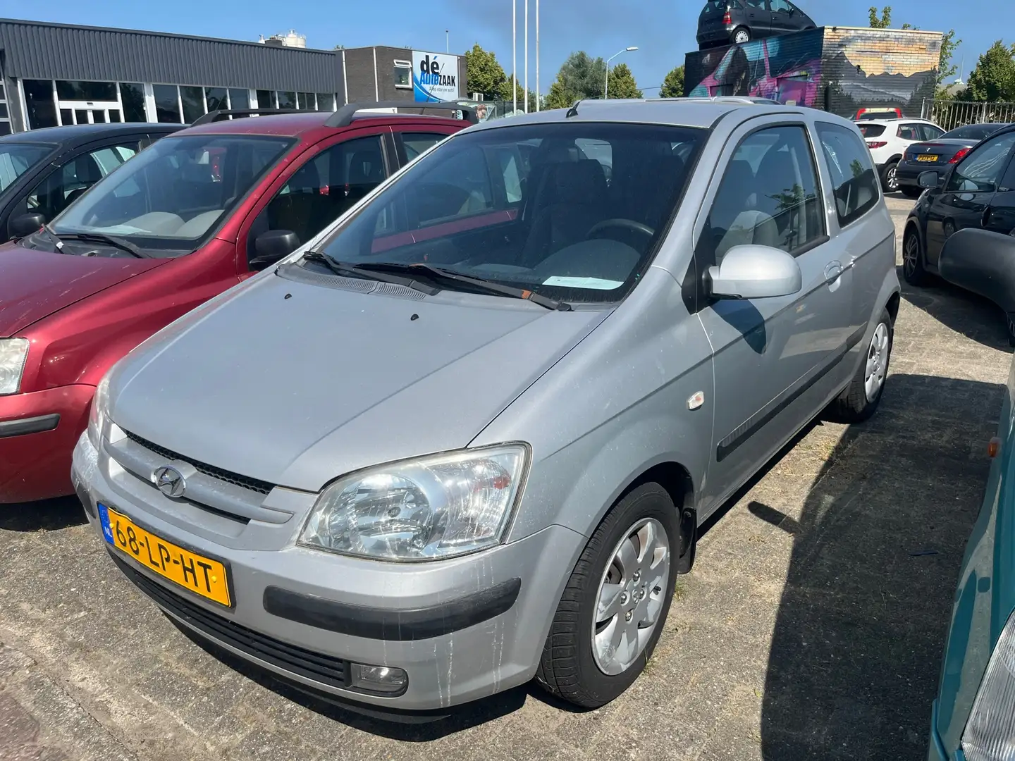 Hyundai Getz 1.3i AUT Lage NAP KM stand! Grijs - 1