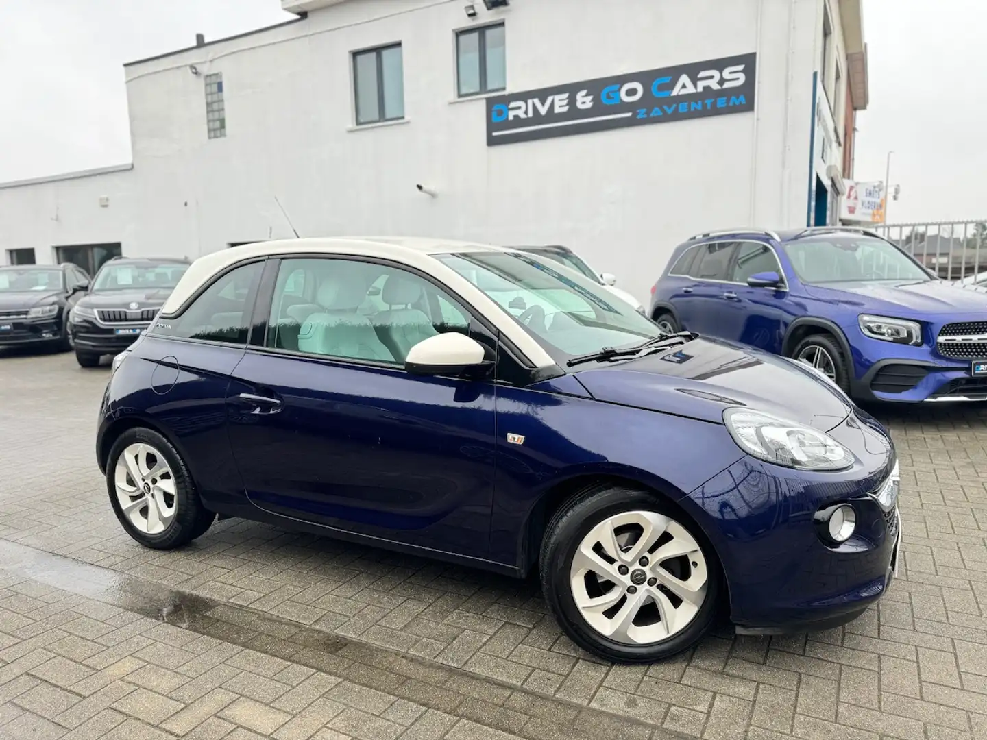 Opel Adam 1.2i Benzine - CarPlay ** 1 JAAR GARANTIE ** !! Noir - 1