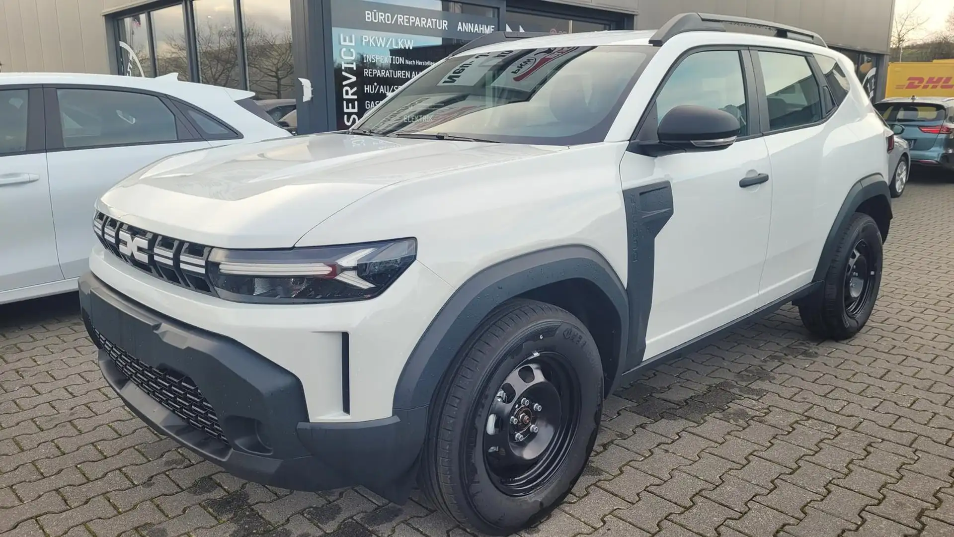 Dacia Duster ECO-G 100 Expression III 100+Radio+Klima+PDC 74... Weiß - 1