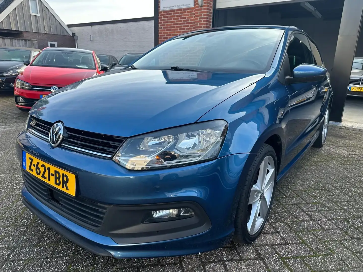 Volkswagen Polo 1.2 TSI R-Line Highline CLIMA-NAVI-PDC_CRUISE Blauw - 1