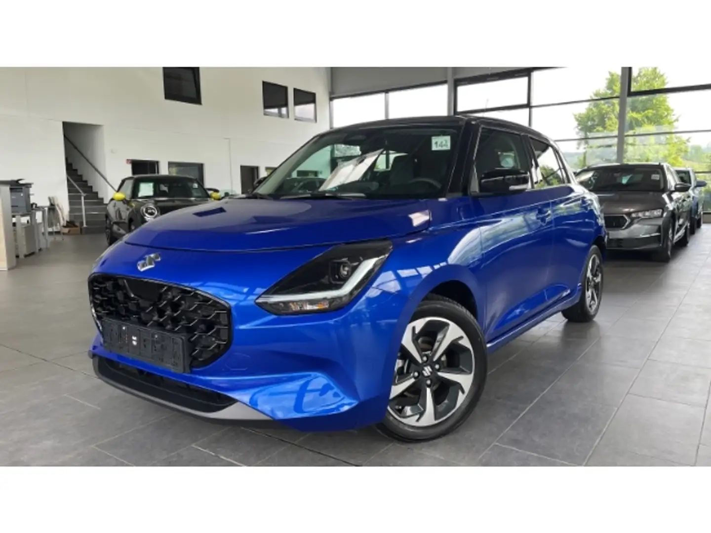 Suzuki Swift 1.2 Comfort + LED NAVI ACC Kamera SitzHZG APP Conn Blauw - 1
