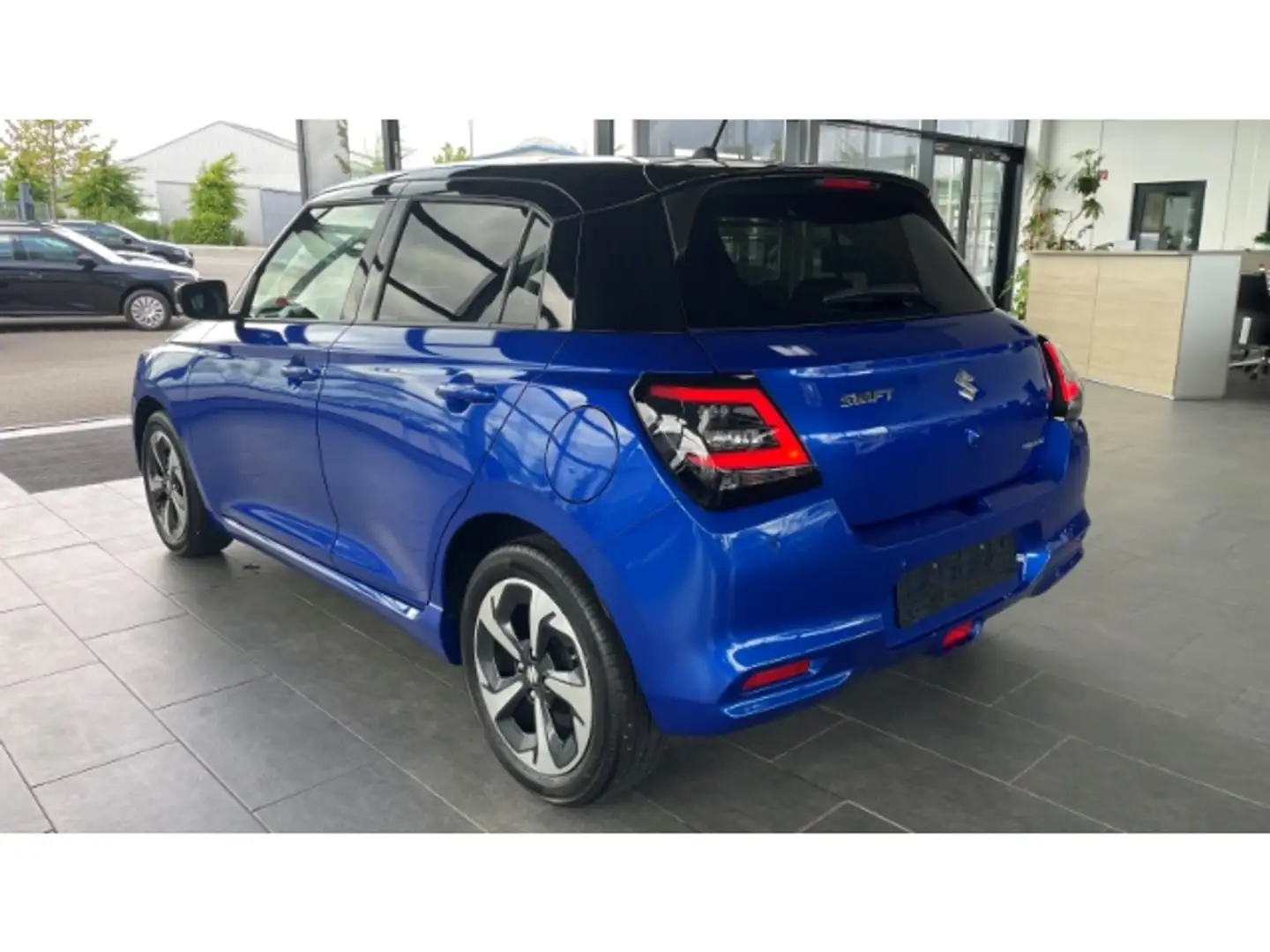 Suzuki Swift 1.2 Comfort + LED NAVI ACC Kamera SitzHZG APP Conn Blauw - 2