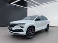 Skoda Karoq 2.0 TDI SCR 4x4 Sportline DSG ILS DAB LED Weiß - thumbnail 1