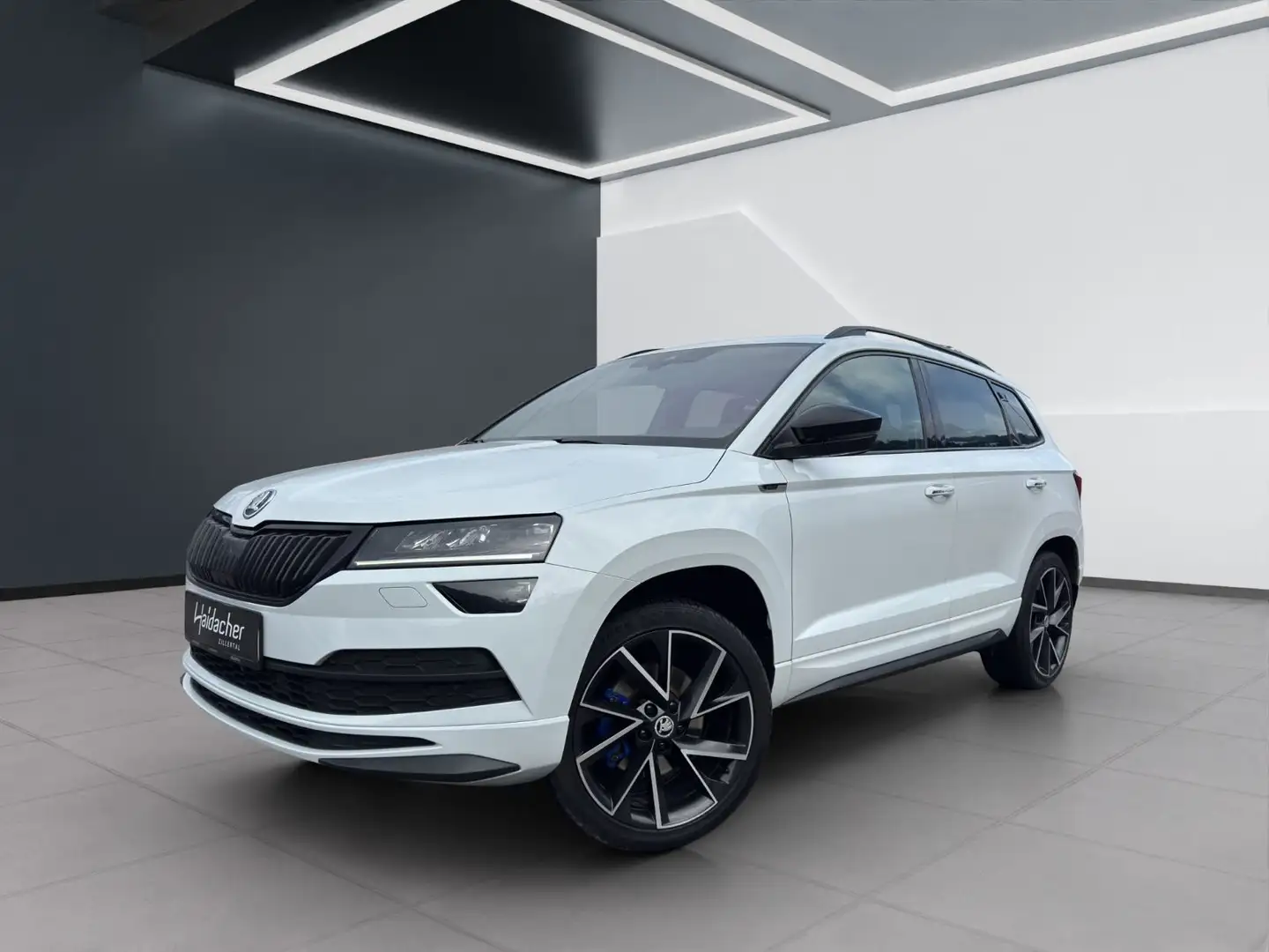 Skoda Karoq 2.0 TDI SCR 4x4 Sportline DSG ILS DAB LED Weiß - 1