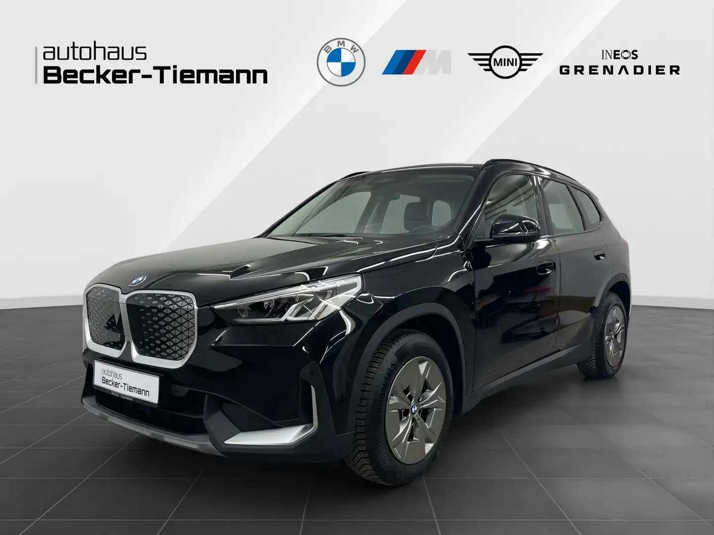 BMW iX1 eDrive20 A,Navi,Rückfahrkamera,Klimaautomatik,etc. Schwarz - 1