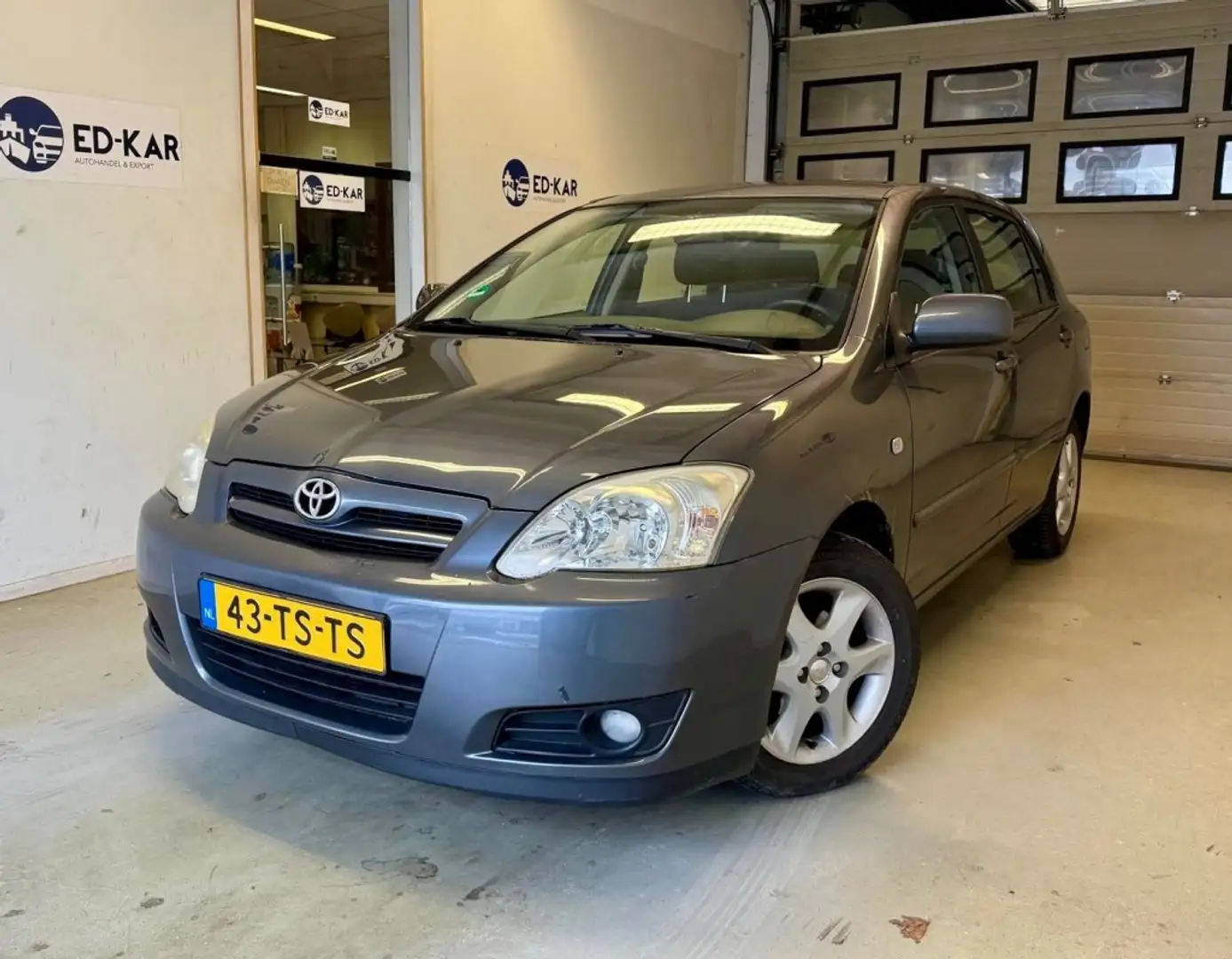 Toyota Corolla 1.6 VVT-i Anniversary 5DRS CLIMA LMV PDC TOP CONDI Grau - 1