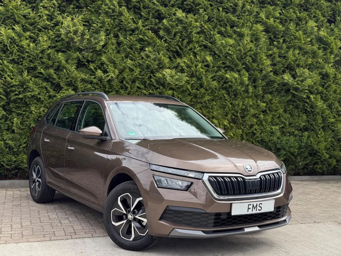 Skoda Kamiq 1.0 TSI Sport CarPlay Automaat Zwart - 1