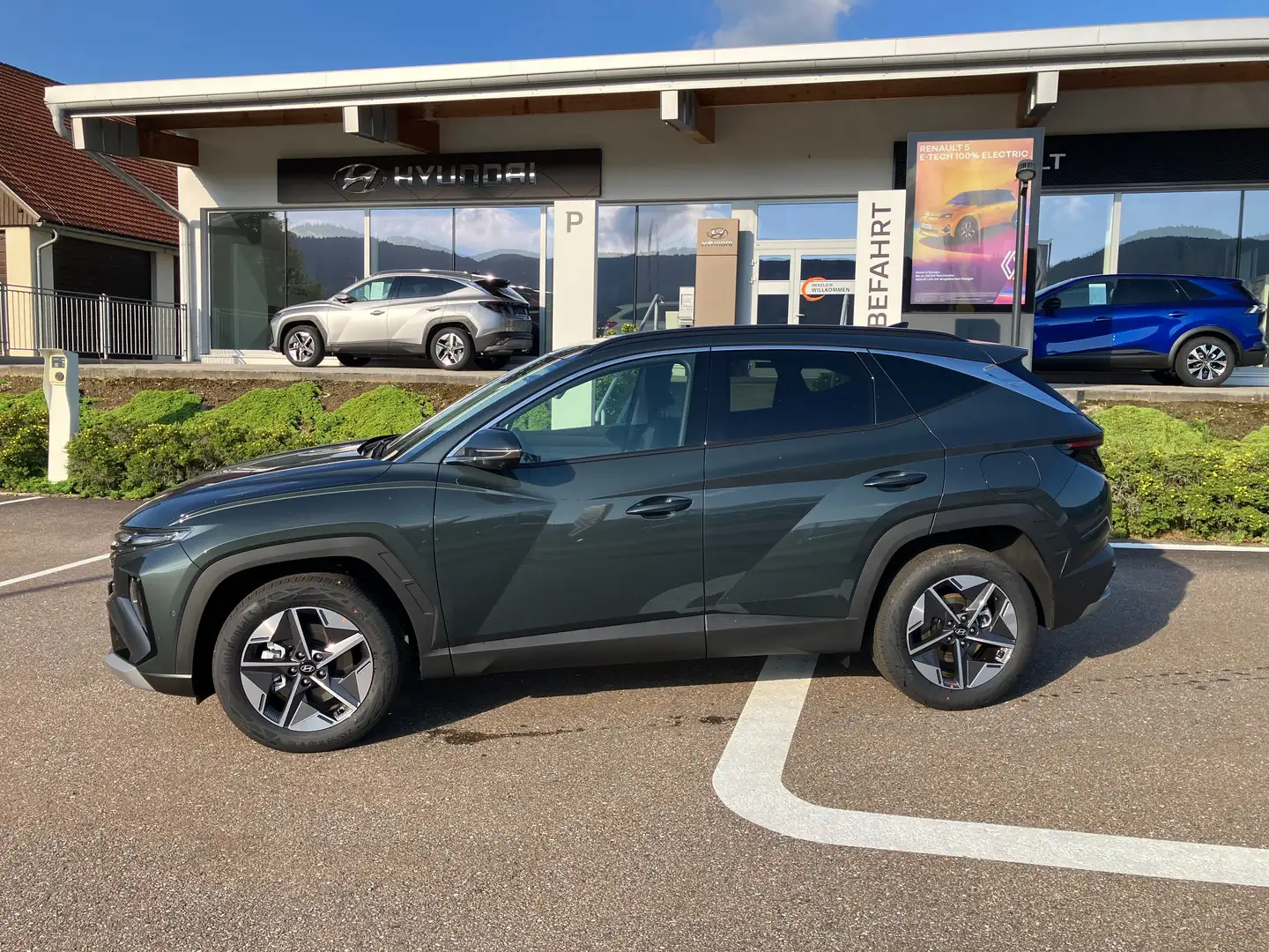 Hyundai TUCSON 1,6 T-GDI HEV 4WD Go Plus Aut. Smart Sense-Paket Grün - 2