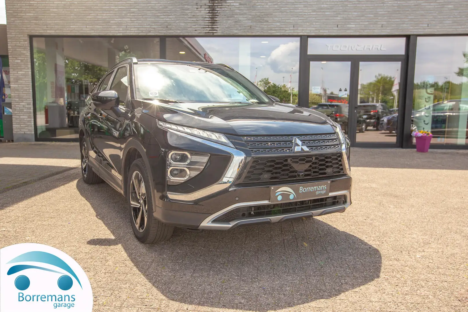 Mitsubishi Eclipse Cross 2.4 PHEV INTENSE EDITION TREKHAAK/4 WD/CAMERA/... Zwart - 1