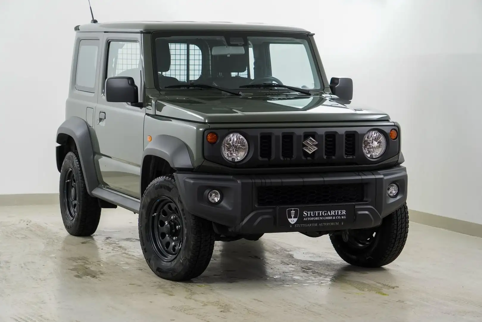 Suzuki Jimny Comfort AllGrip Klima SHZ 4WD Garantie Grün - 1