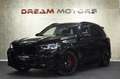 BMW X5 45e M-Sport xDrive 394pk | AKRAPOVIC | MASSAGE | 4 Zwart - thumbnail 1