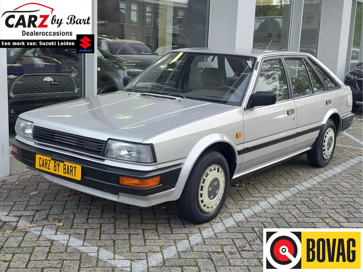 Nissan Bluebird 1.6 LX met STUURBEKRACHTIGING! Zilver - 1