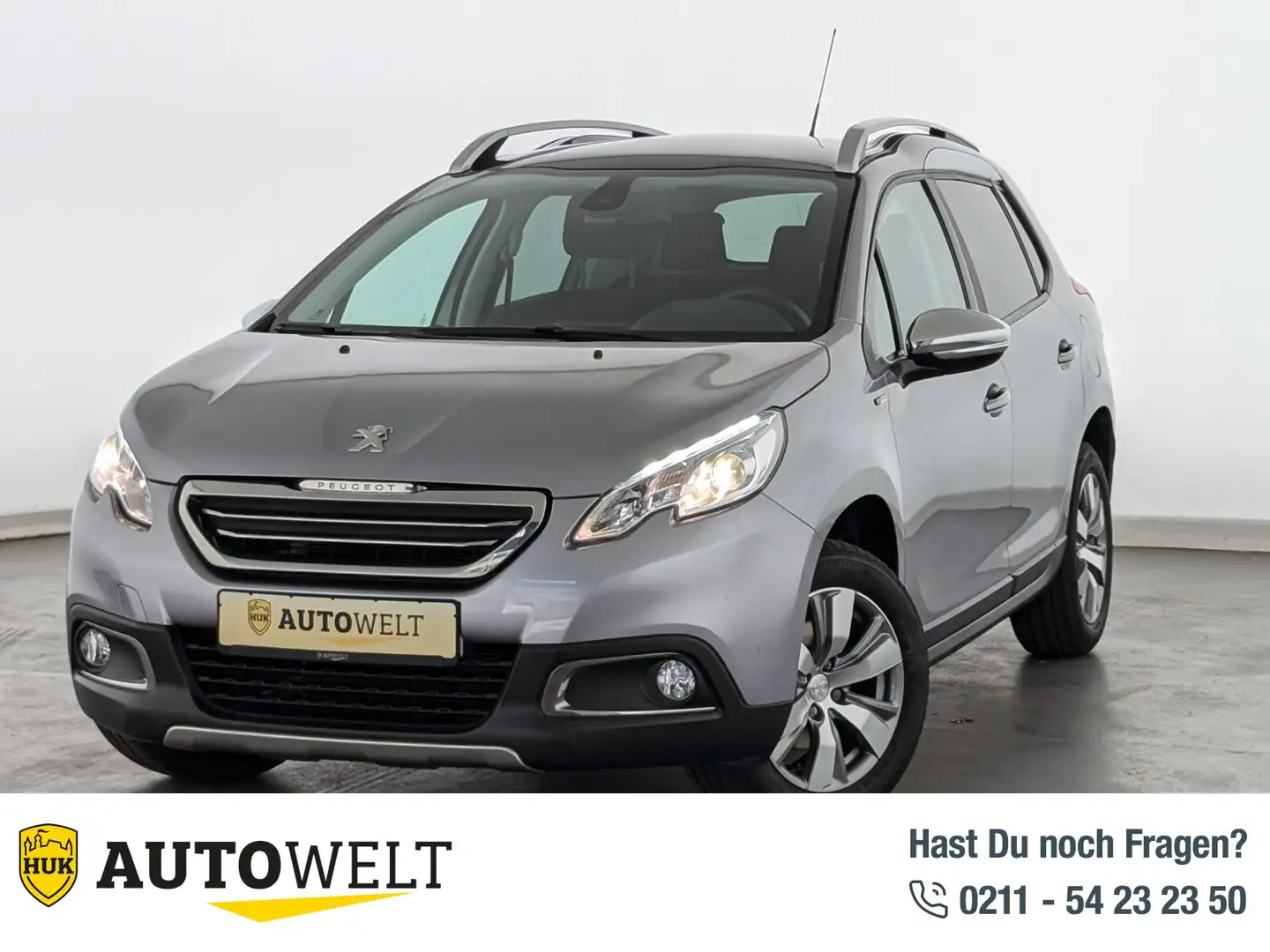 Peugeot 2008 2008 1.2 PureTech 110 Style PANO+BLUETOOTH+PDC+ BC Grau - 1