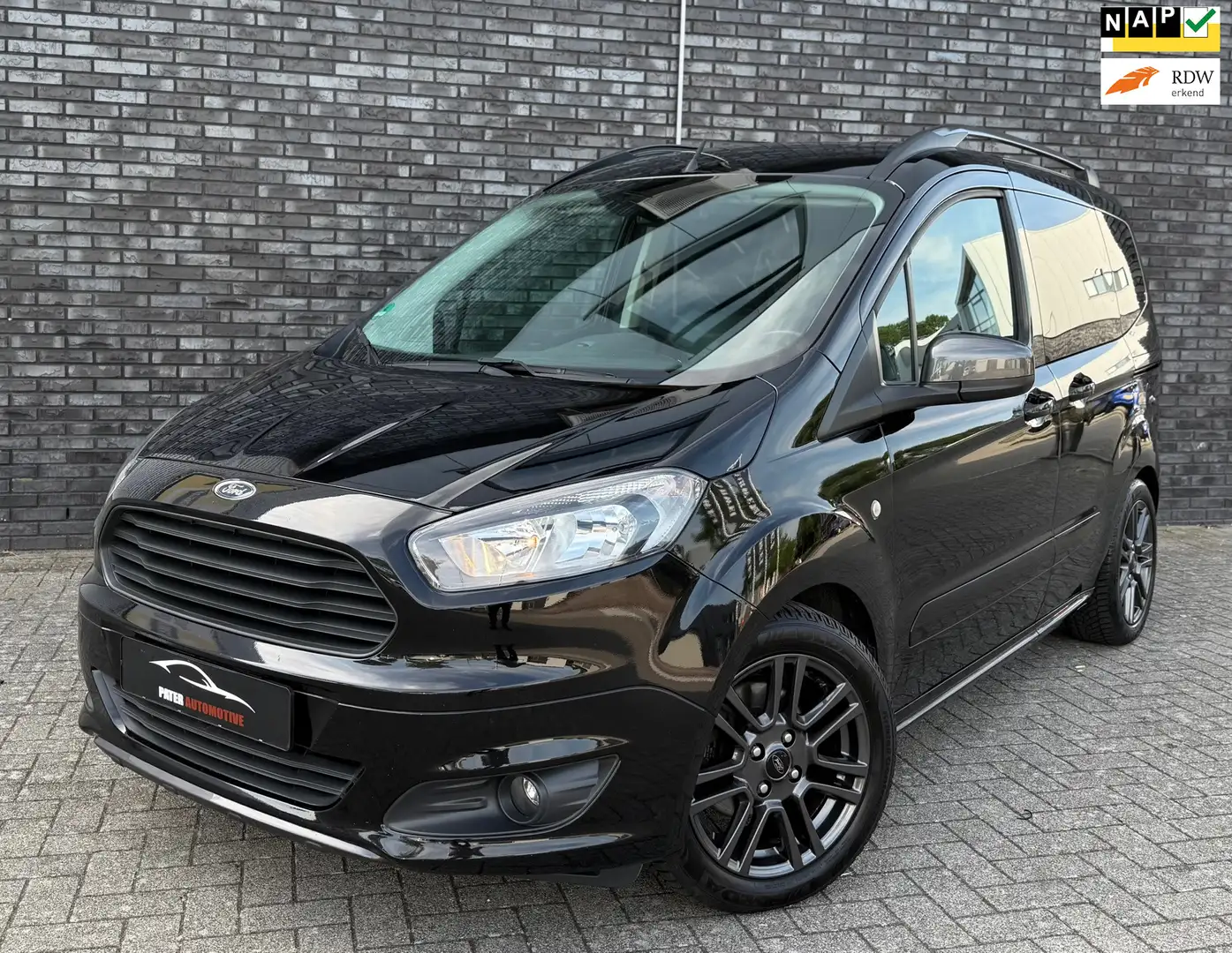 Ford Tourneo Courier 1.0 Titanium Black Line|Navigatie|Stoelverwarming| Zwart - 1