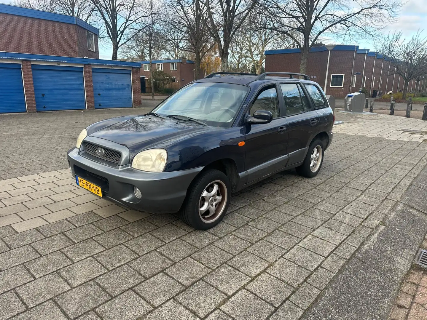 Hyundai SANTA FE 2.0i-16V Motion Airco Cruise Nw APK Blau - 1