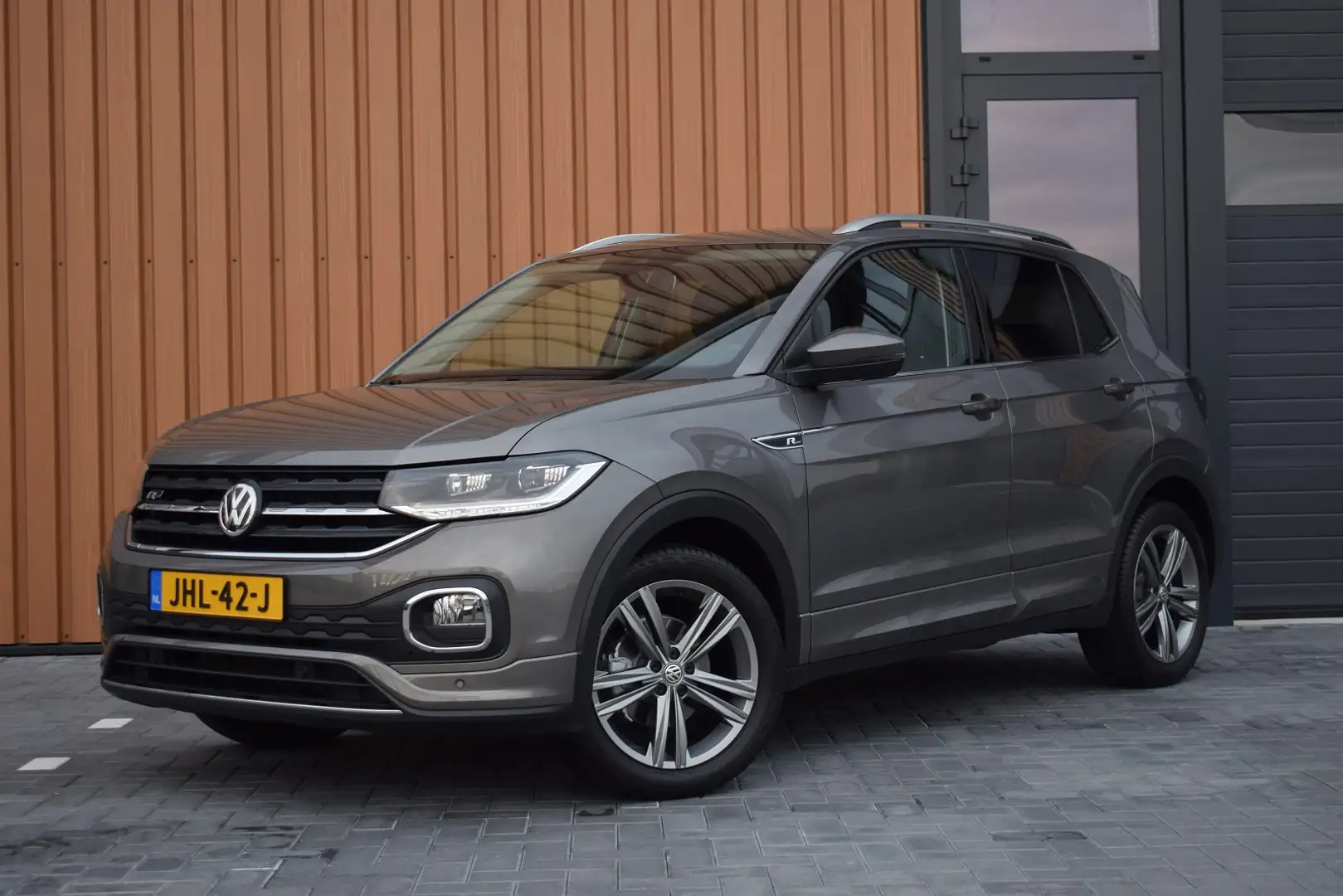 Volkswagen T-Cross 1.0 TSI 116pk DSG R-line | Camera | Virtual | Trek Grijs - 1