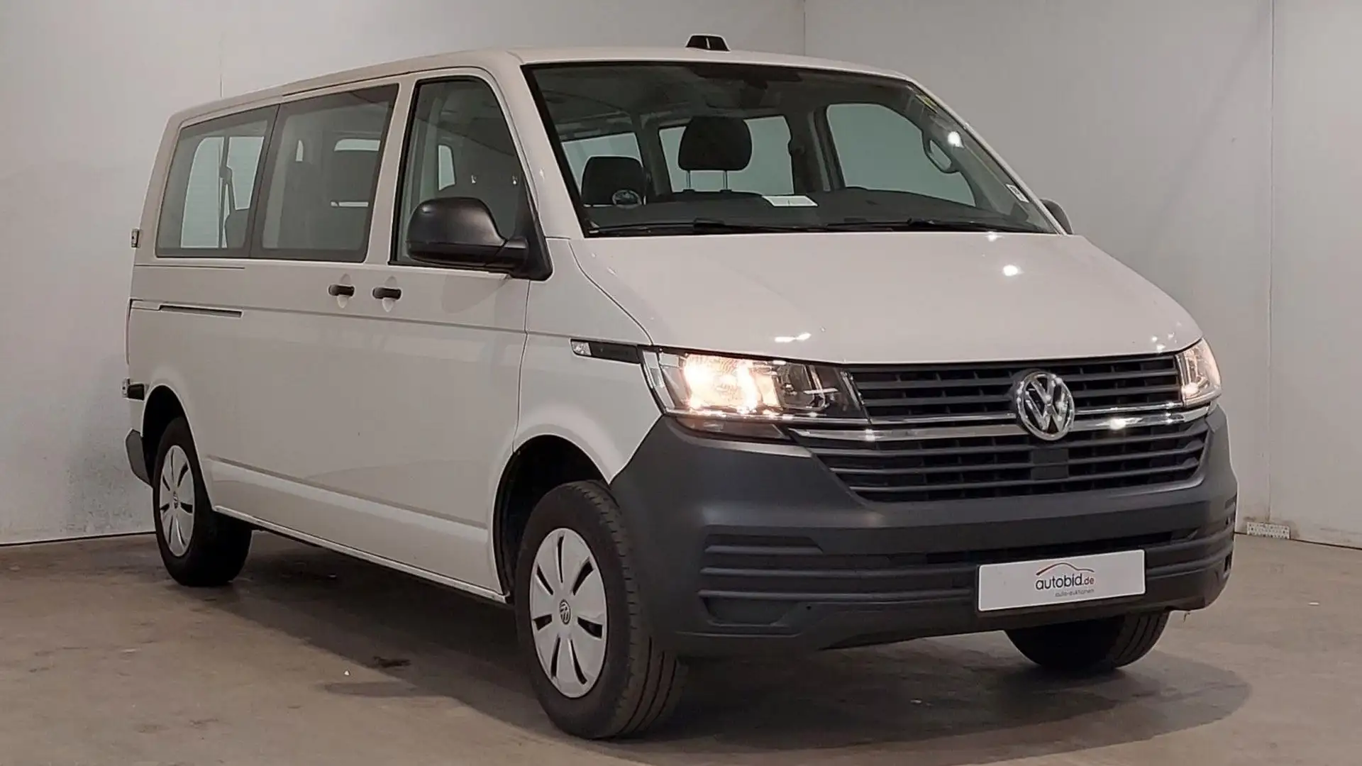Volkswagen T6 Transporter T6.1*GARANTIE*8Sitzer*Klima*Navi*PDC*1.Hand*Lang Wit - 1