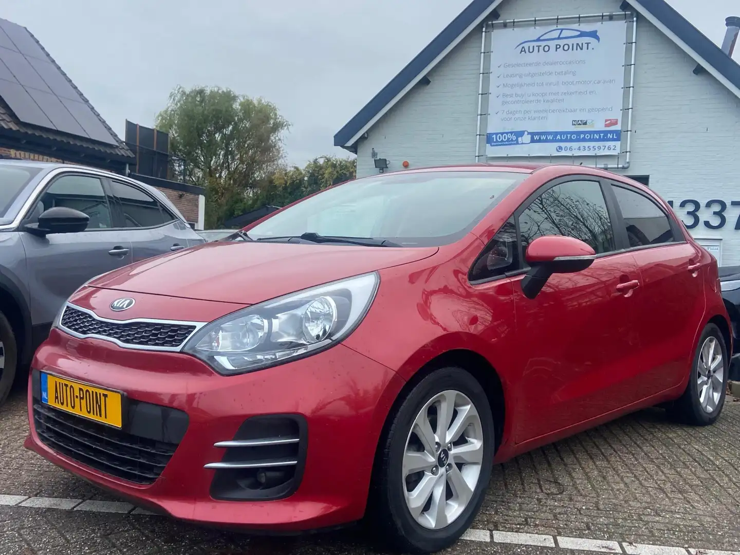 Kia Rio 1.2 Dynamic Line CLIMA/PDC/STOELVERW/CRUISE Rood - 1