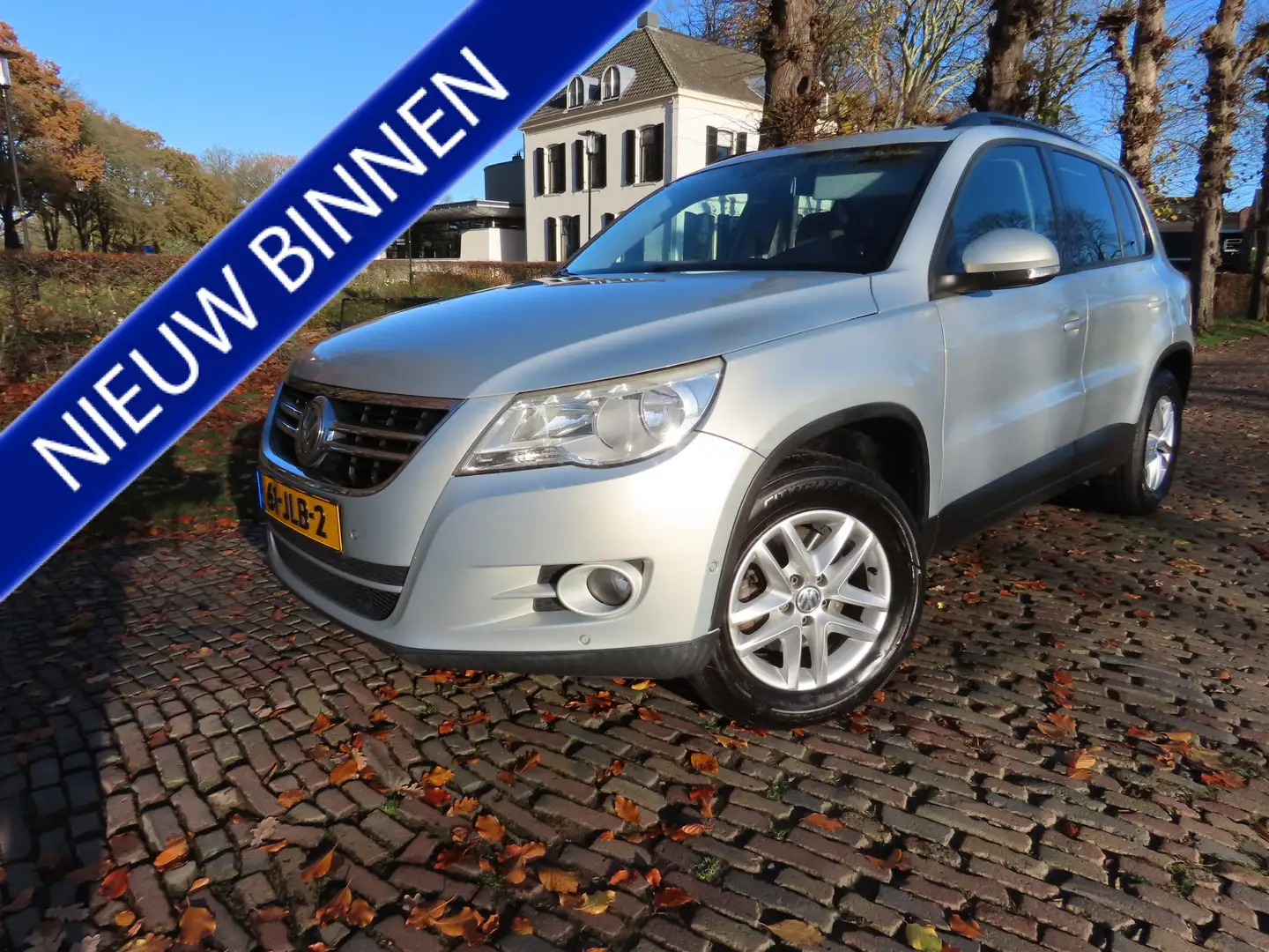 Volkswagen Tiguan 1.4 TSI Comfort&Design Elektrisch Glazen Panoramad Grijs - 1