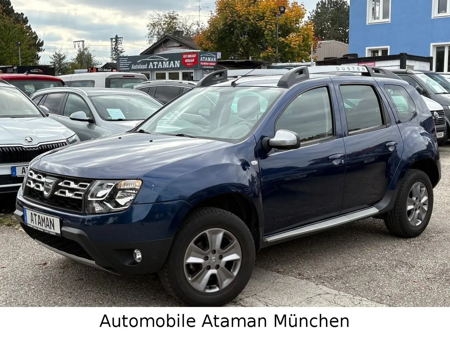 Dacia Duster 1.2 Celebration 4x2 / Klima / Navi / PTS Blau - 2