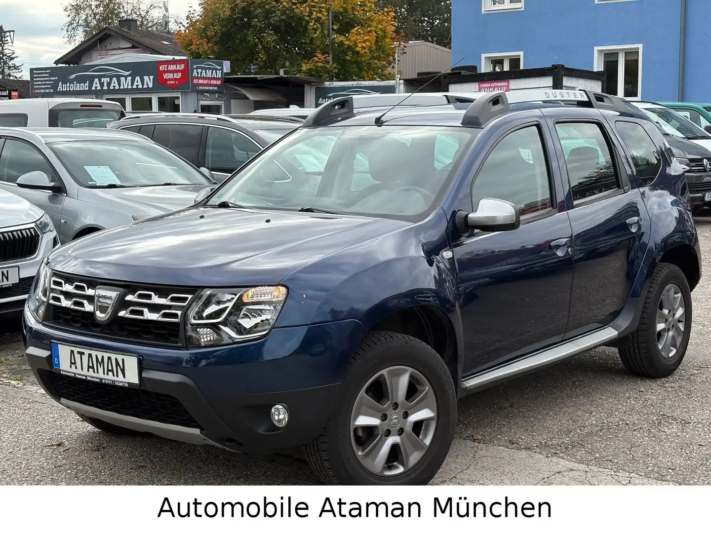 Dacia Duster 1.2 Celebration 4x2 / Klima / Navi / PTS Blau - 1