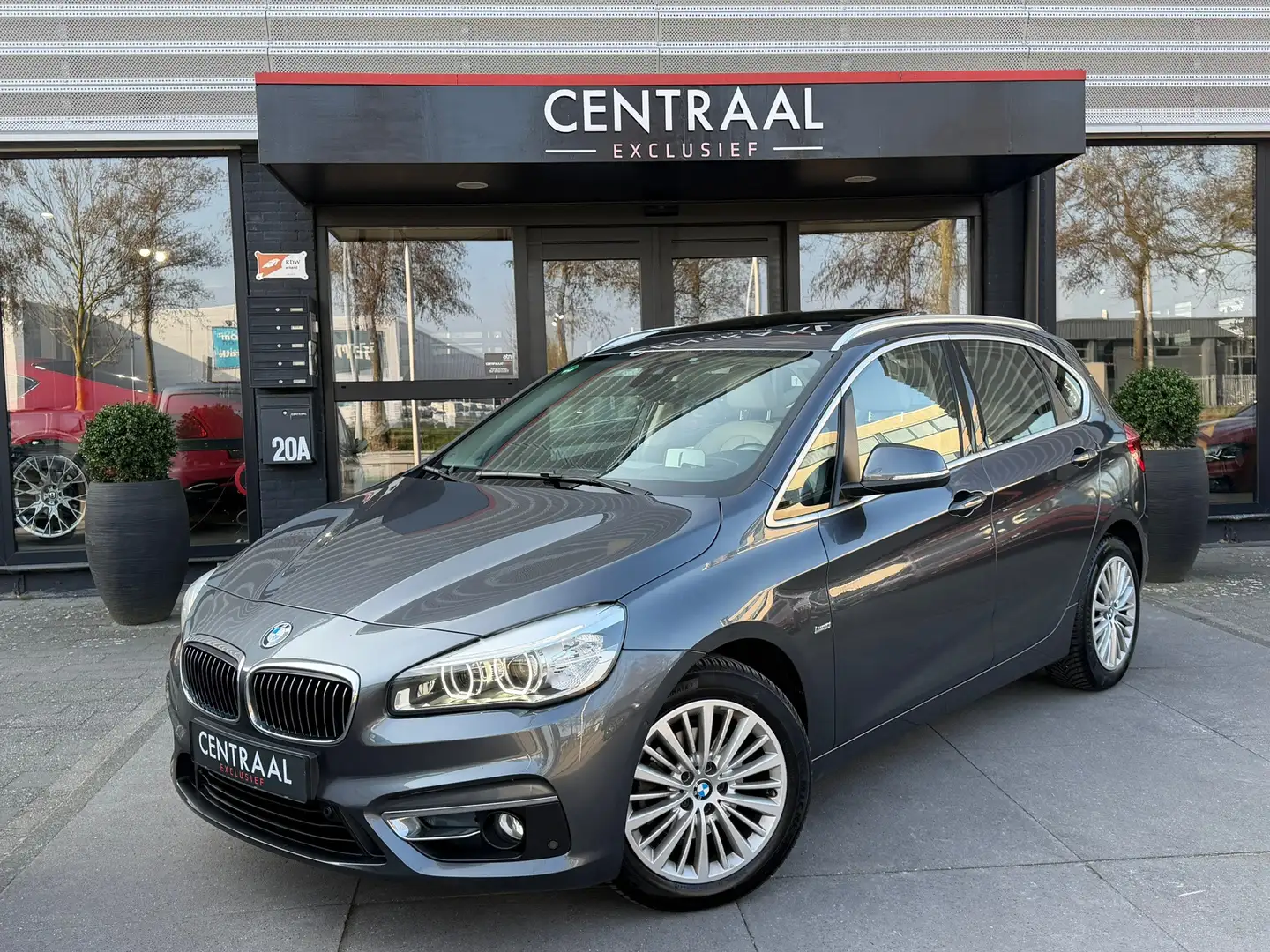 BMW 218 2-serie Active Tourer 218i High Exe Leder|Pano|NL- Grau - 1