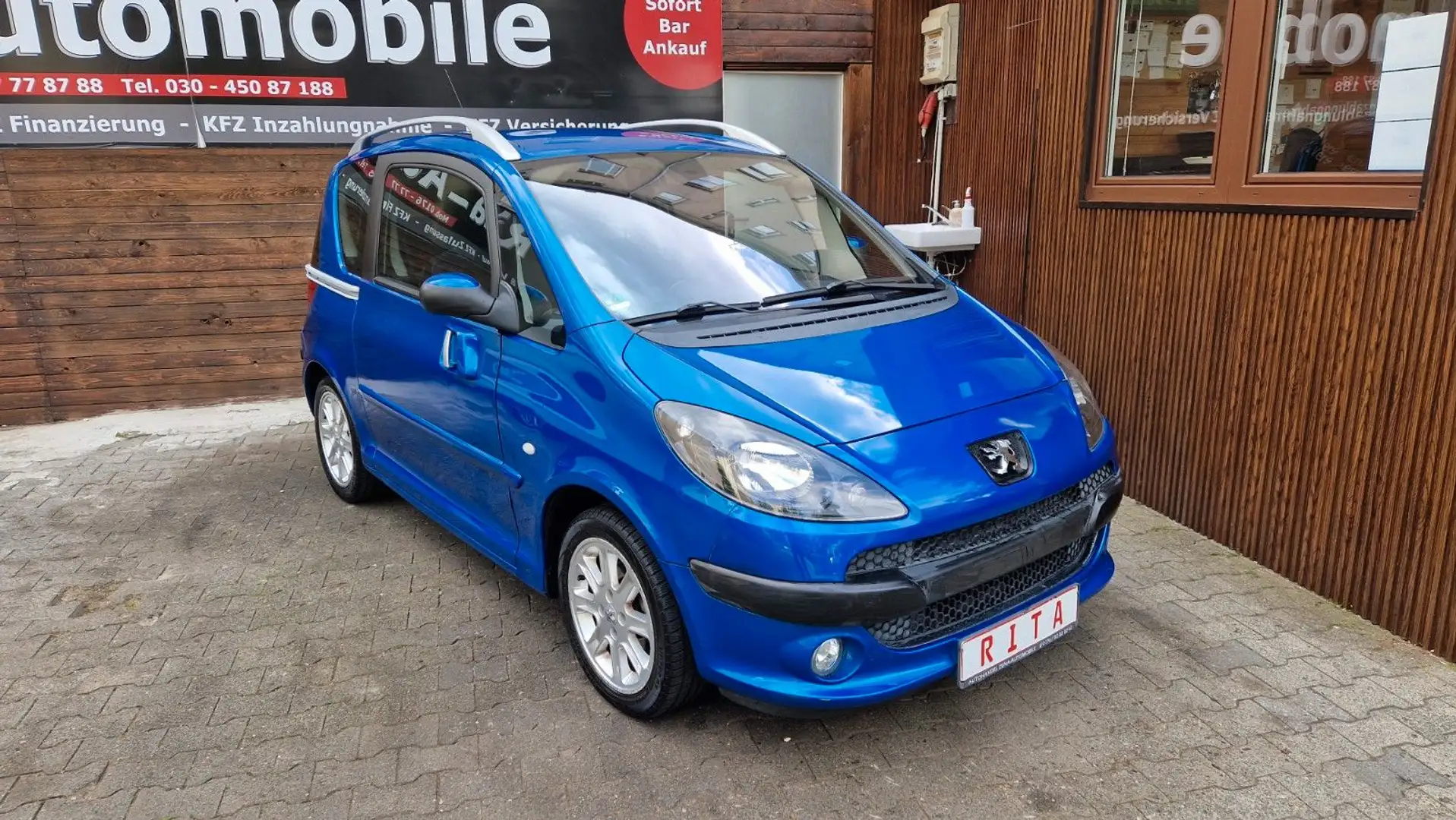 Peugeot 1007 Premium Automatik, PDC, Tempomat Blau - 1