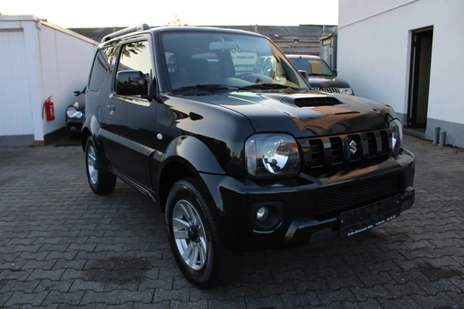 Suzuki Jimny Style Lim. *1.Hand*Klima*Leder*Sehr gepflegt* Zwart - 1