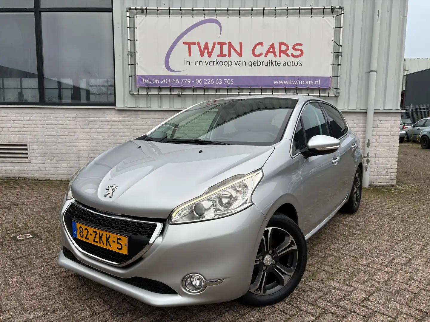 Peugeot 208 1.4 VTi Griffe 5drs Airco Navi Leer Gris - 2