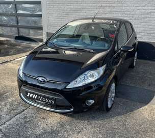 1.25i Titanium * Airco * 67dKM * 2012 * Garantie