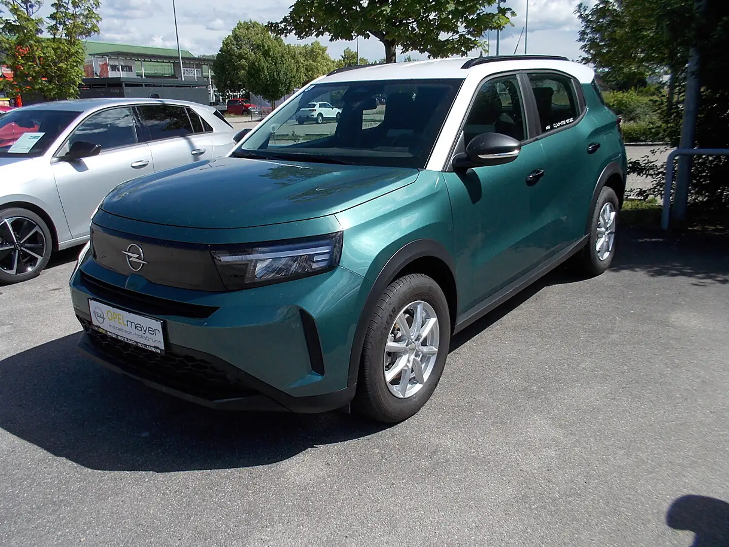 Opel Frontera 1.2 DI MHEV Edition Aut. Grün - 1