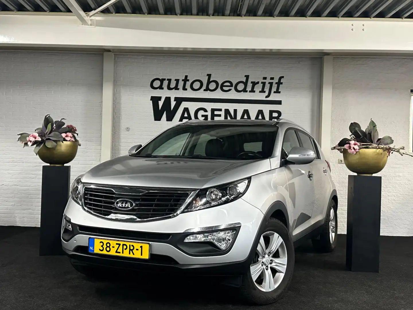Kia Sportage 2.0 X-ecutive Plus Pack Automaat/Navi Gris - 1