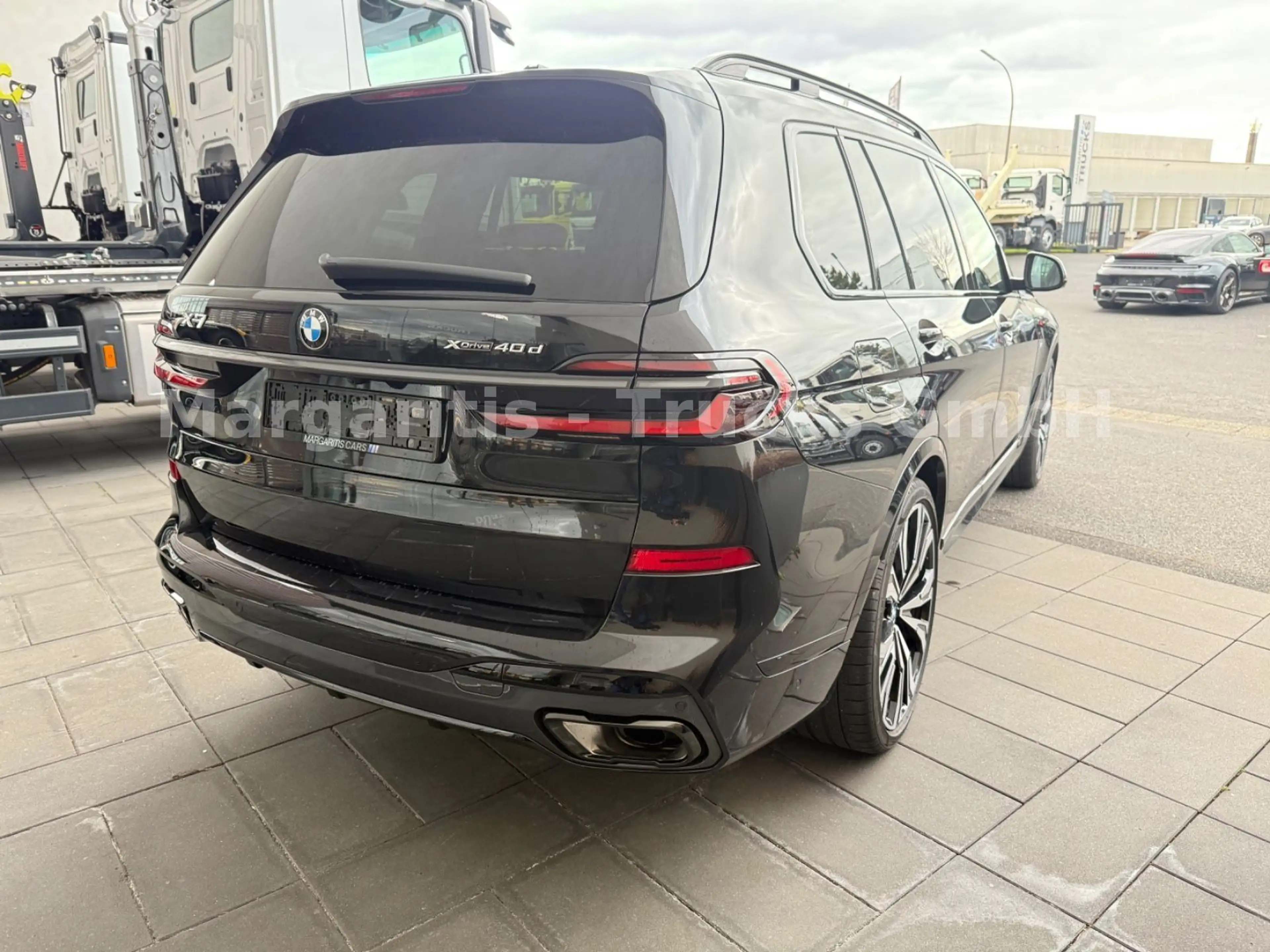 BMW X7 xDrive40d/MPaketPro/Pano/23"/H&K/Carbon — photo 5