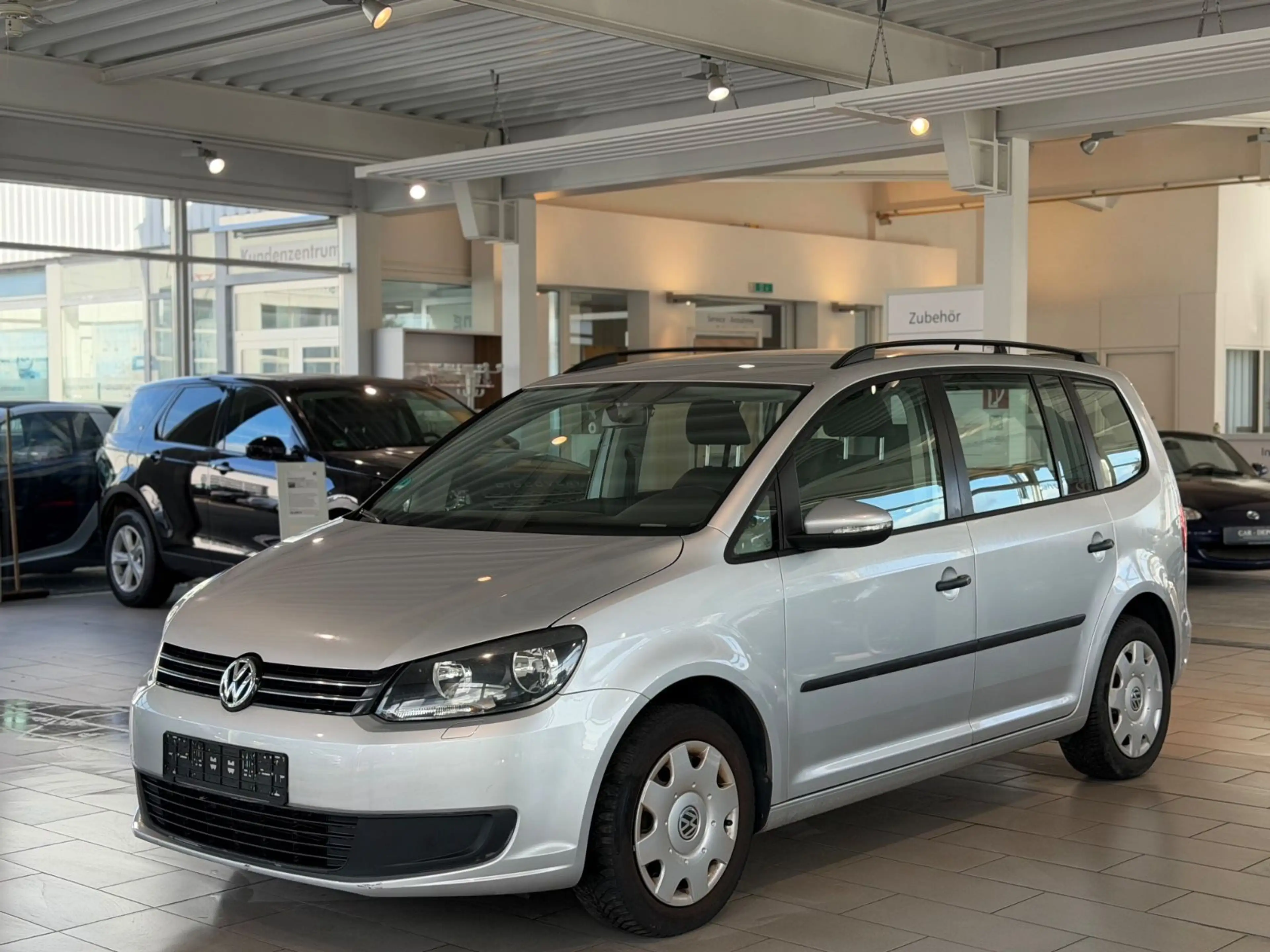 Volkswagen Touran Comfortline BMT*KLIMAAUT.*7.SITZ*NAVI*PDC — photo 2