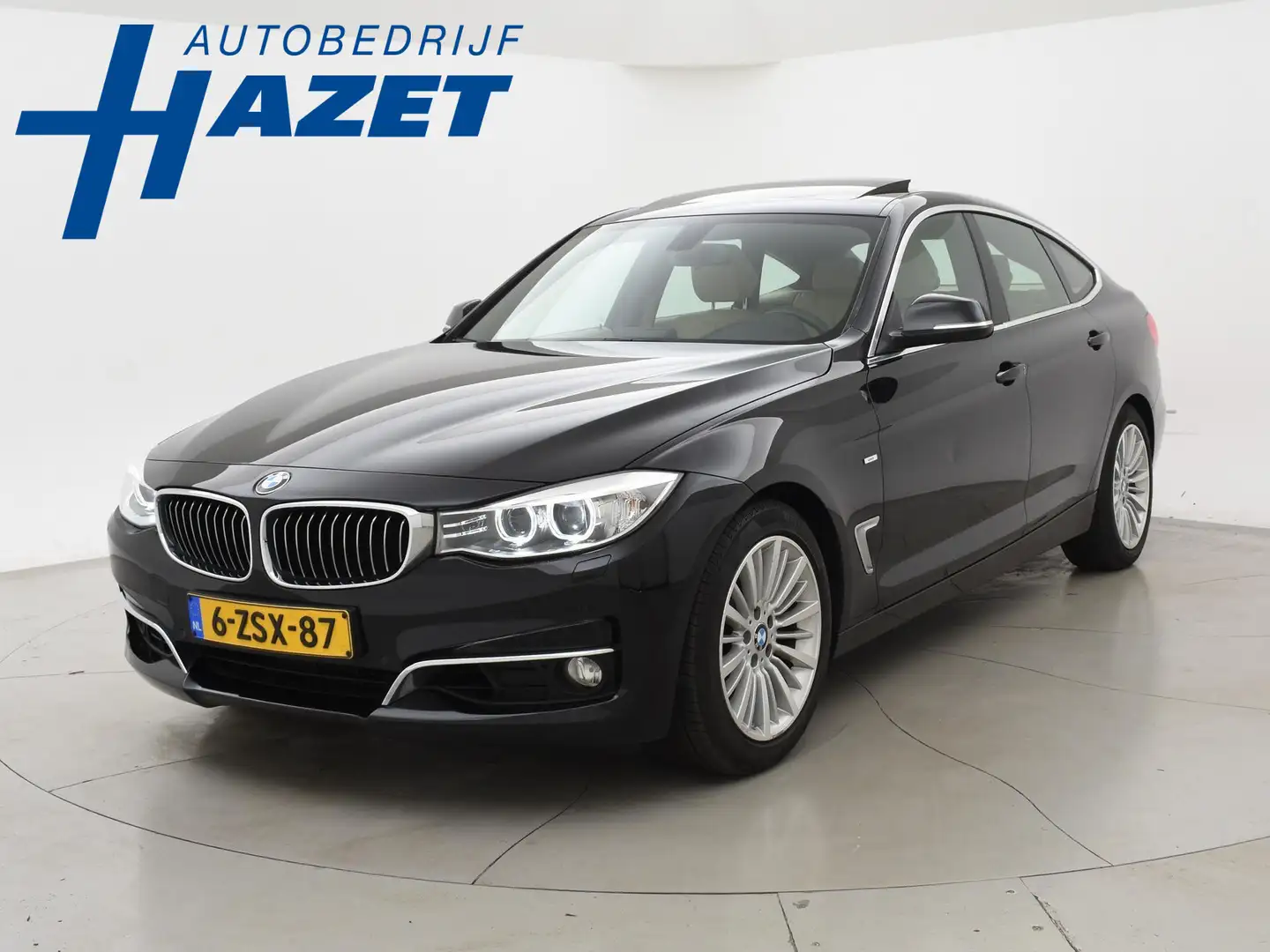 BMW 320 3-serie Gran Turismo 320i GT LUXURY + PANORAMA / N Zwart - 1