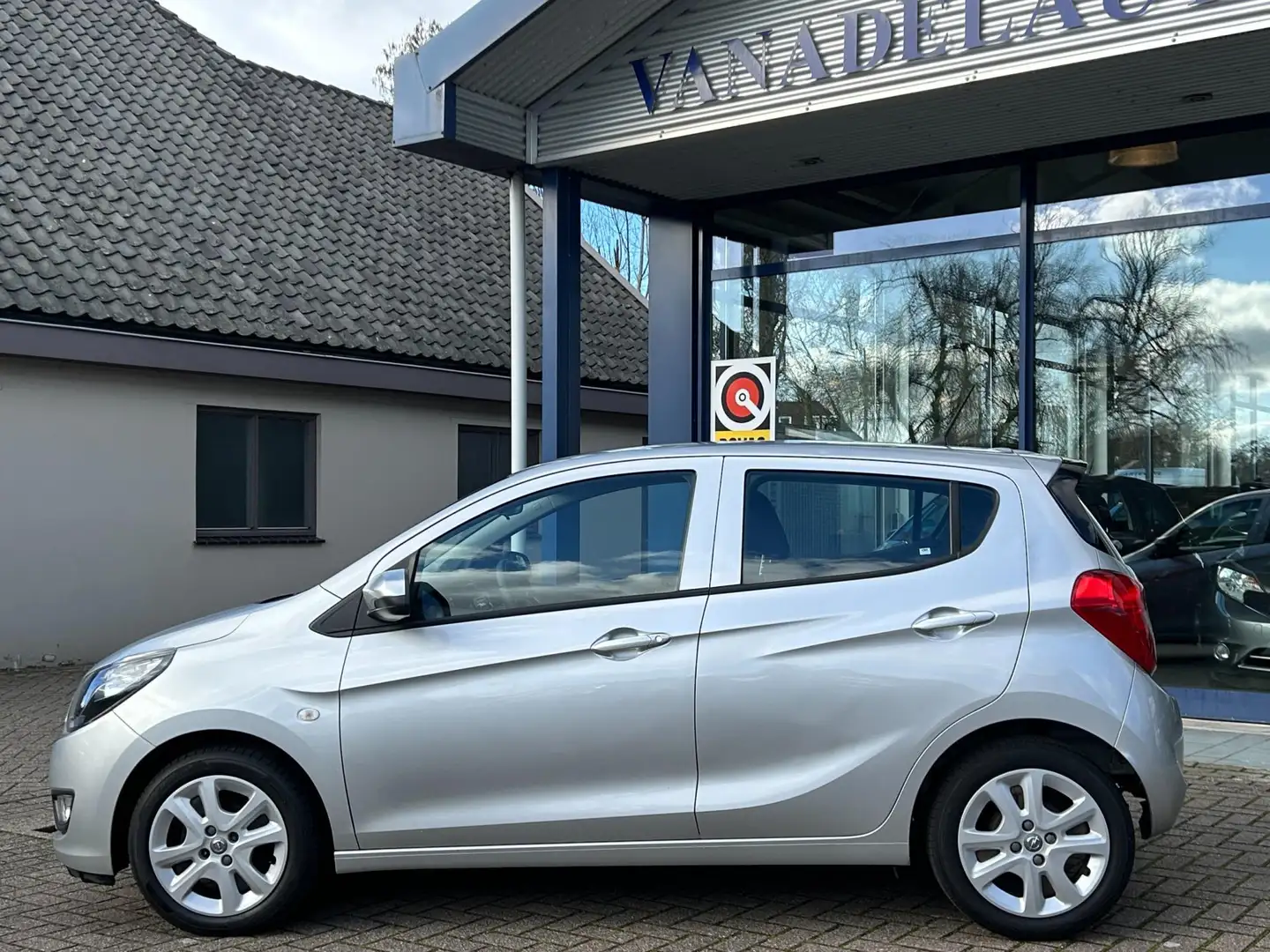Opel Karl 1.0 ecoFLEX Edition Aut. Airco Park.Sens Cruise NA Grijs - 2