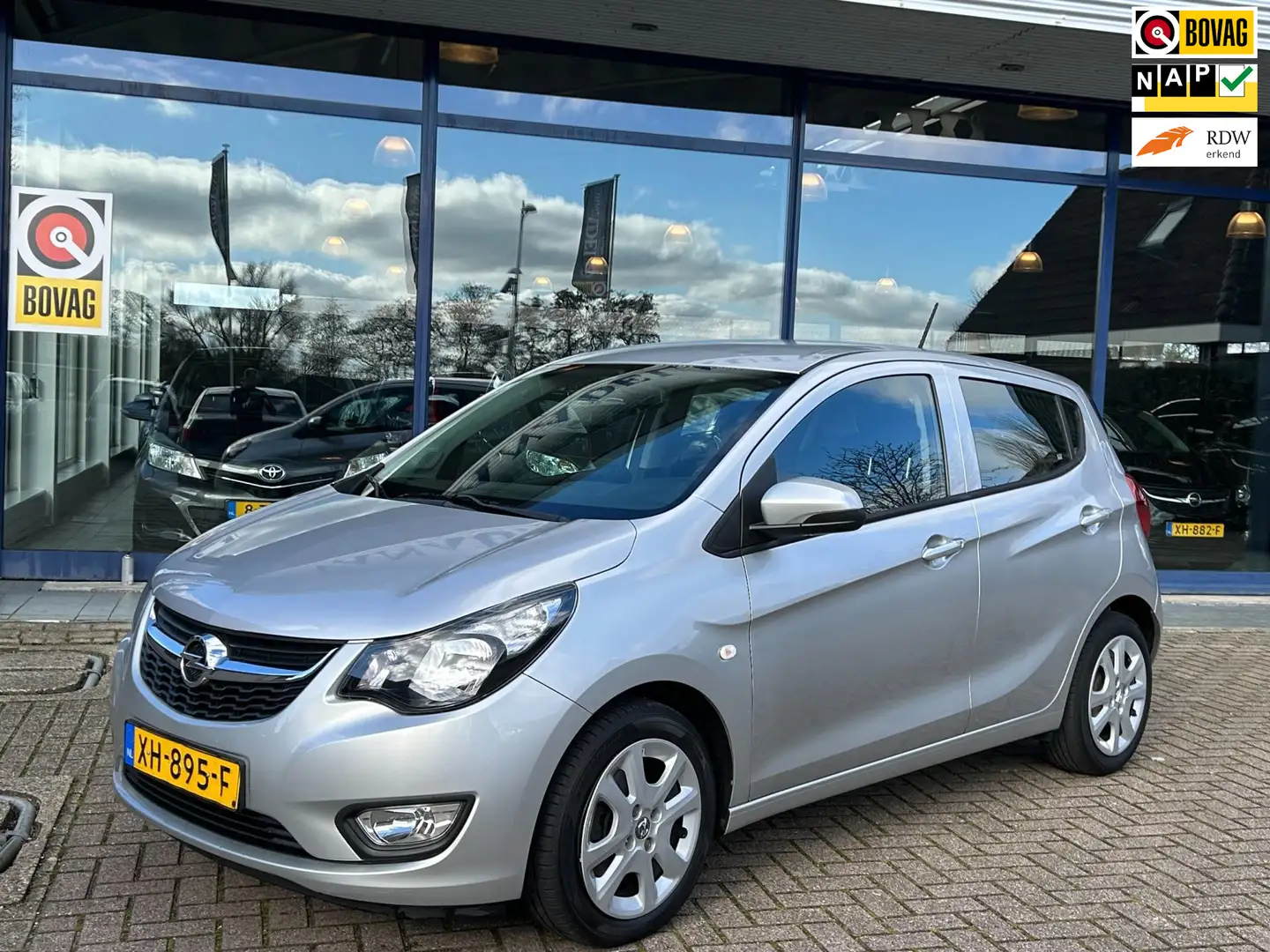 Opel Karl 1.0 ecoFLEX Edition Aut. Airco Park.Sens Cruise NA Grijs - 1