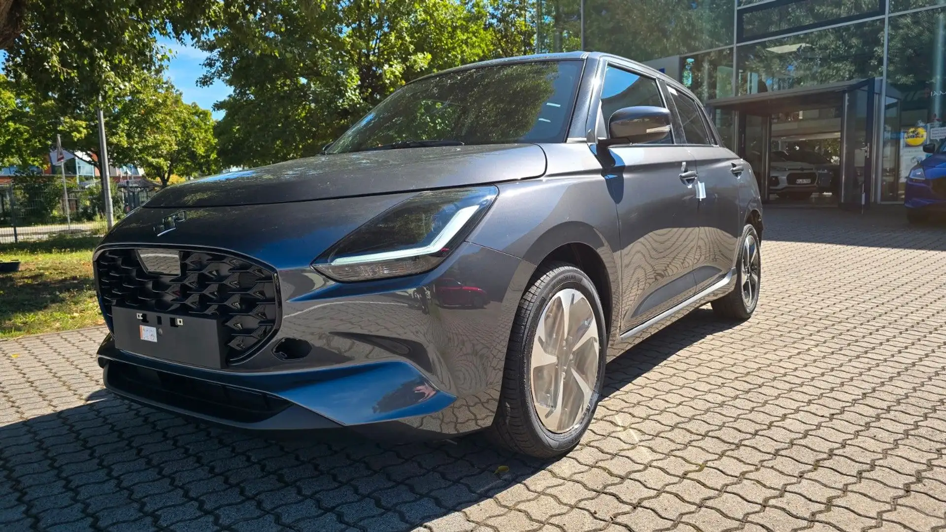 Suzuki Swift 1.2 Comfort+ Hybrid  CVT Grijs - 1