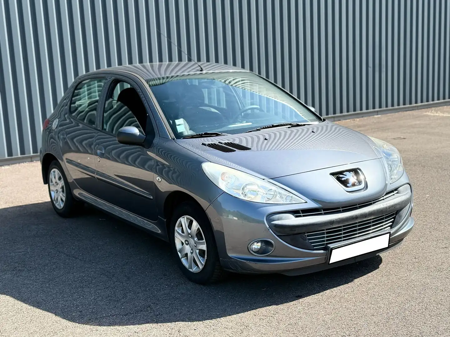 Peugeot 206 206+ 1.4 HDi 70ch BLUE LION Trendy - 1
