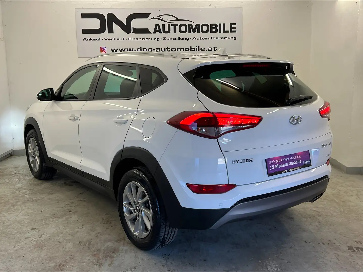 Hyundai TUCSON 2,0 CRDI 4WD Style Aut. Weiß - 2