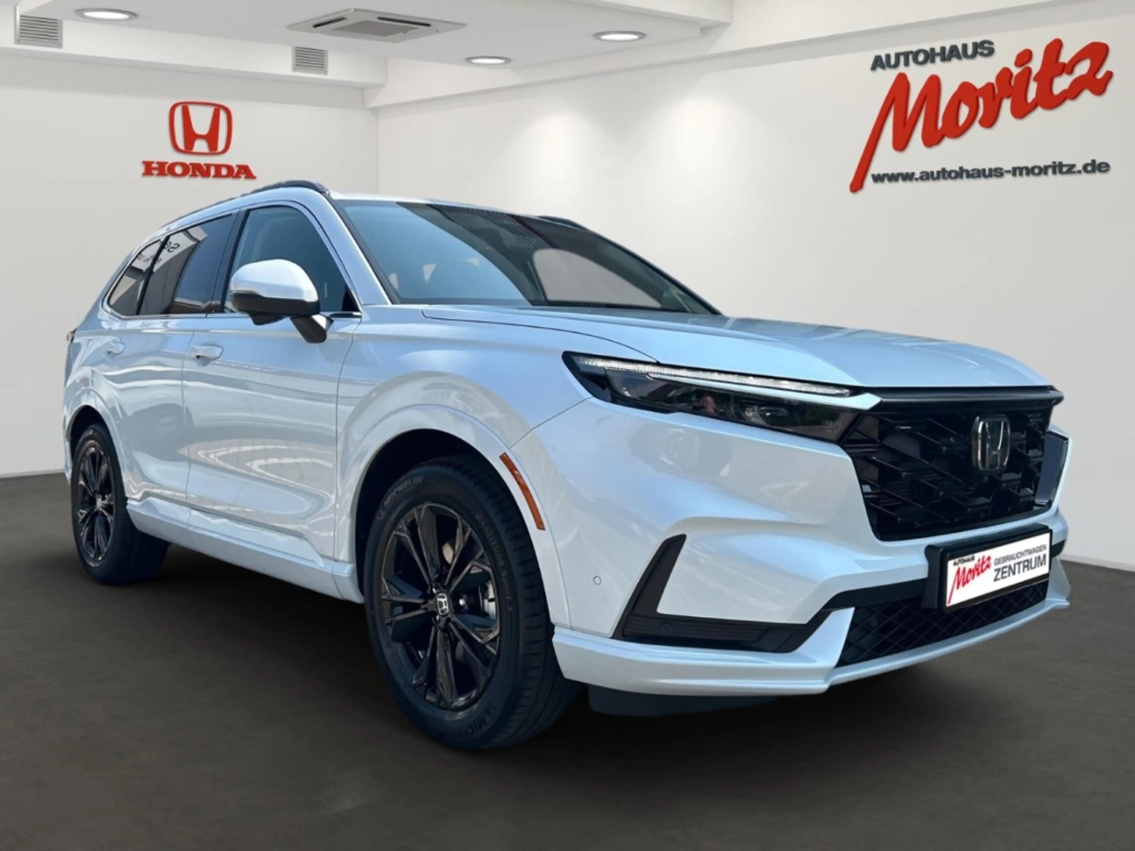 Honda CR-V 2WD Plug-in-Hybrid 2.0 e PHEV Advance Tech Park-As — photo 3